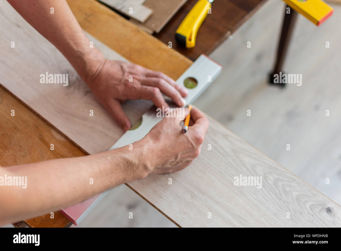Installation Laminate Or Parquet In The Room Worker Installing