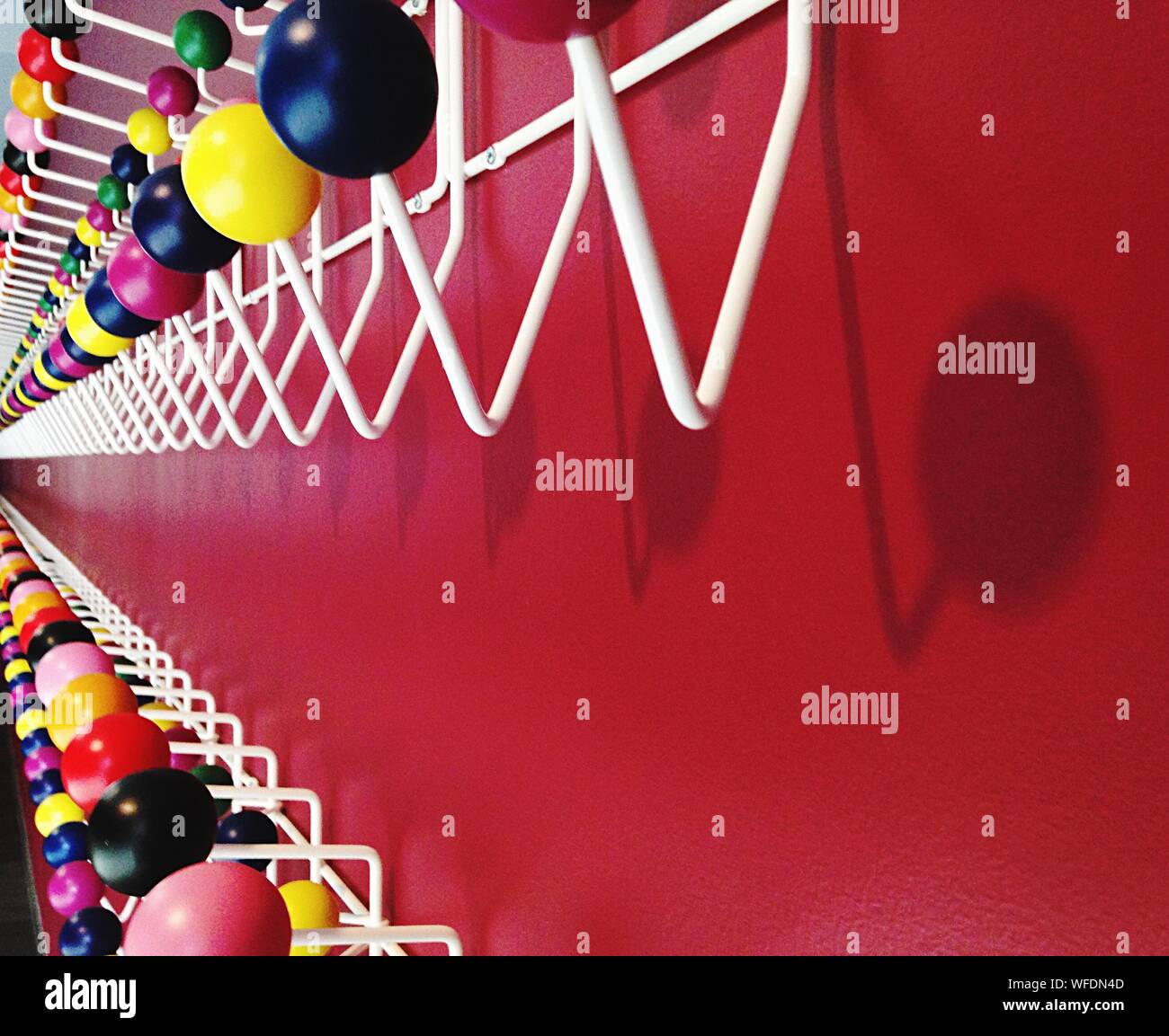 Coat Hangers On Wall Stock Photo Alamy