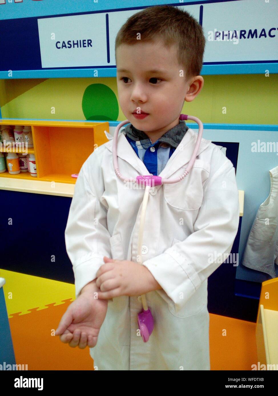 Cute Boy Wearing Doctor Costume Stock Photo Alamy