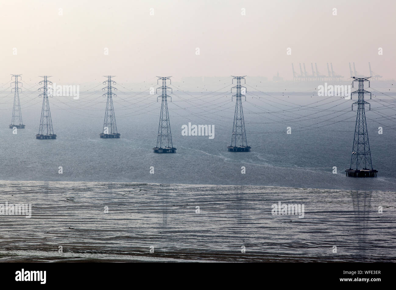Electricity pylons in water hires stock photography and images Alamy