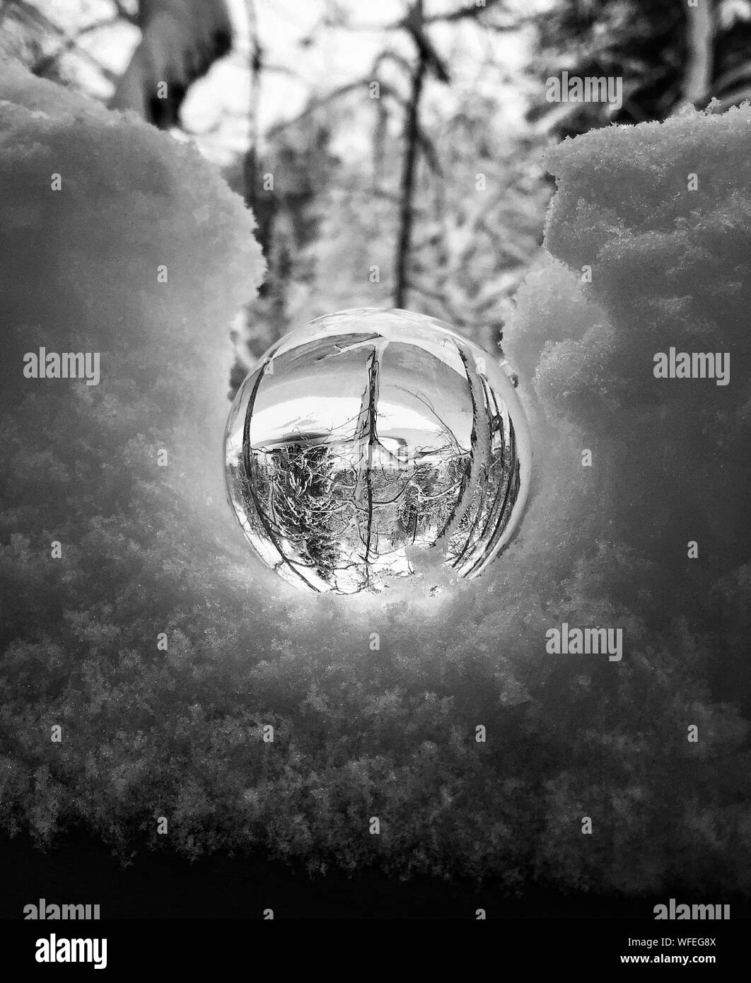 Close Up Of Crystal Ball With Reflection On Snow Stock Photo Alamy