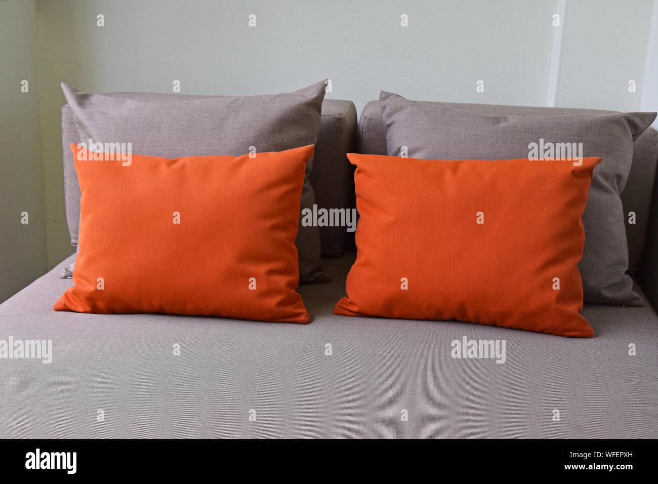 Cushions On Bed Stock Photo