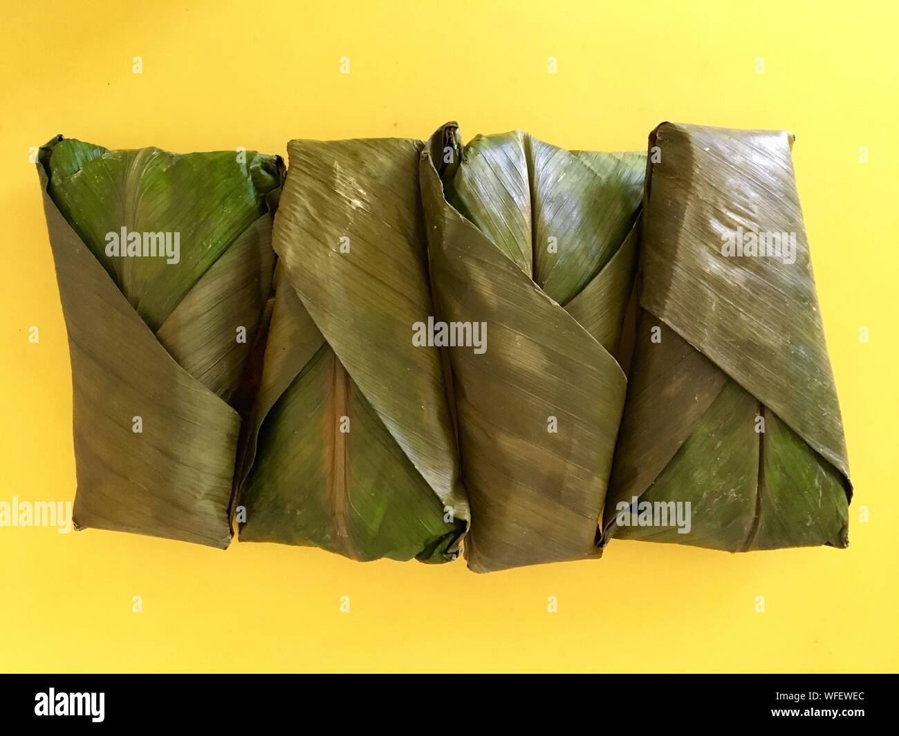 Food Wrapped In Banana Leaves High Resolution Stock Photography and