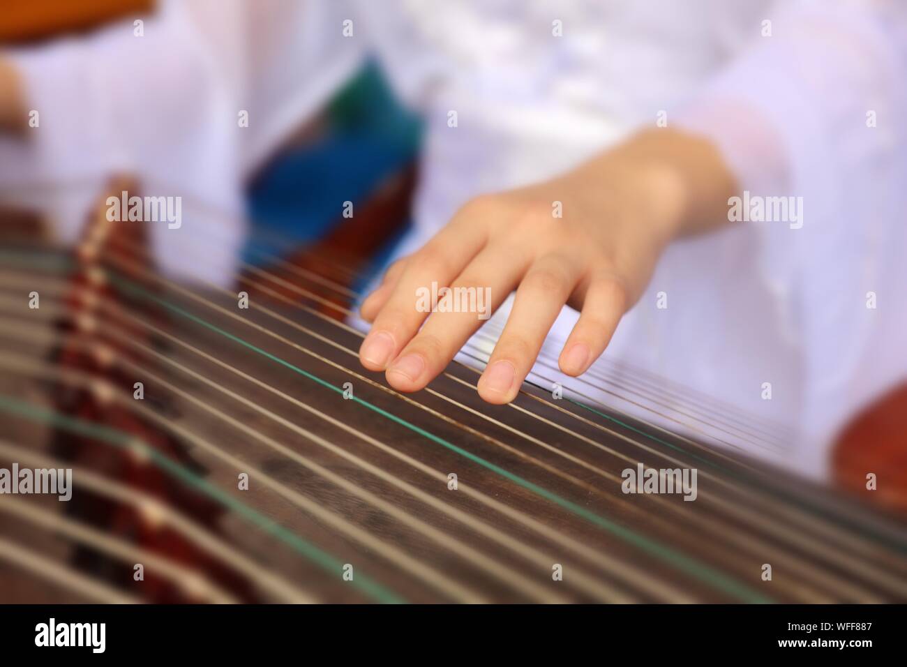 Person playing instrument hi-res stock photography and images - Alamy
