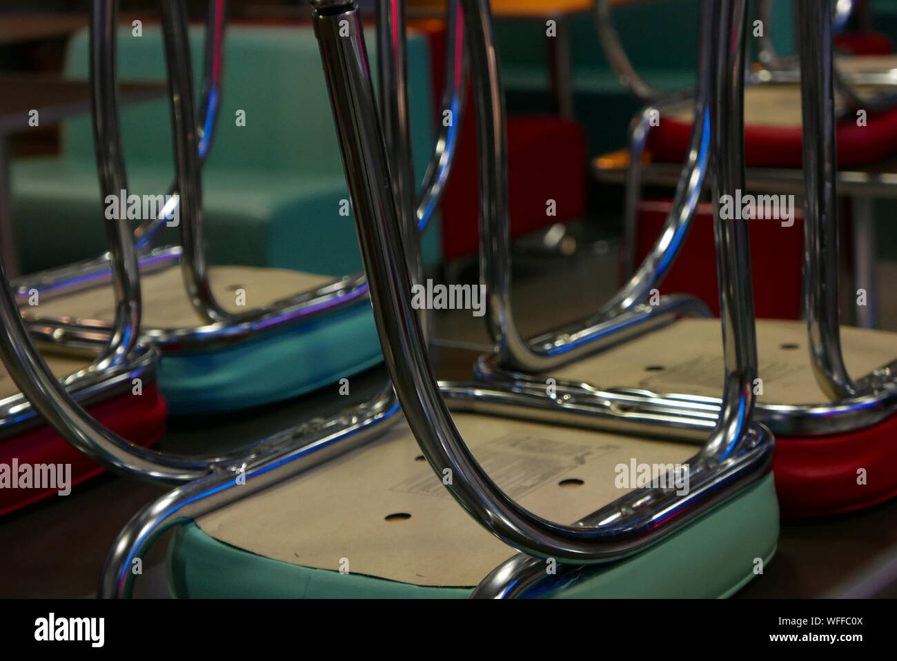 Restaurant chairs upside down on hires stock photography and images