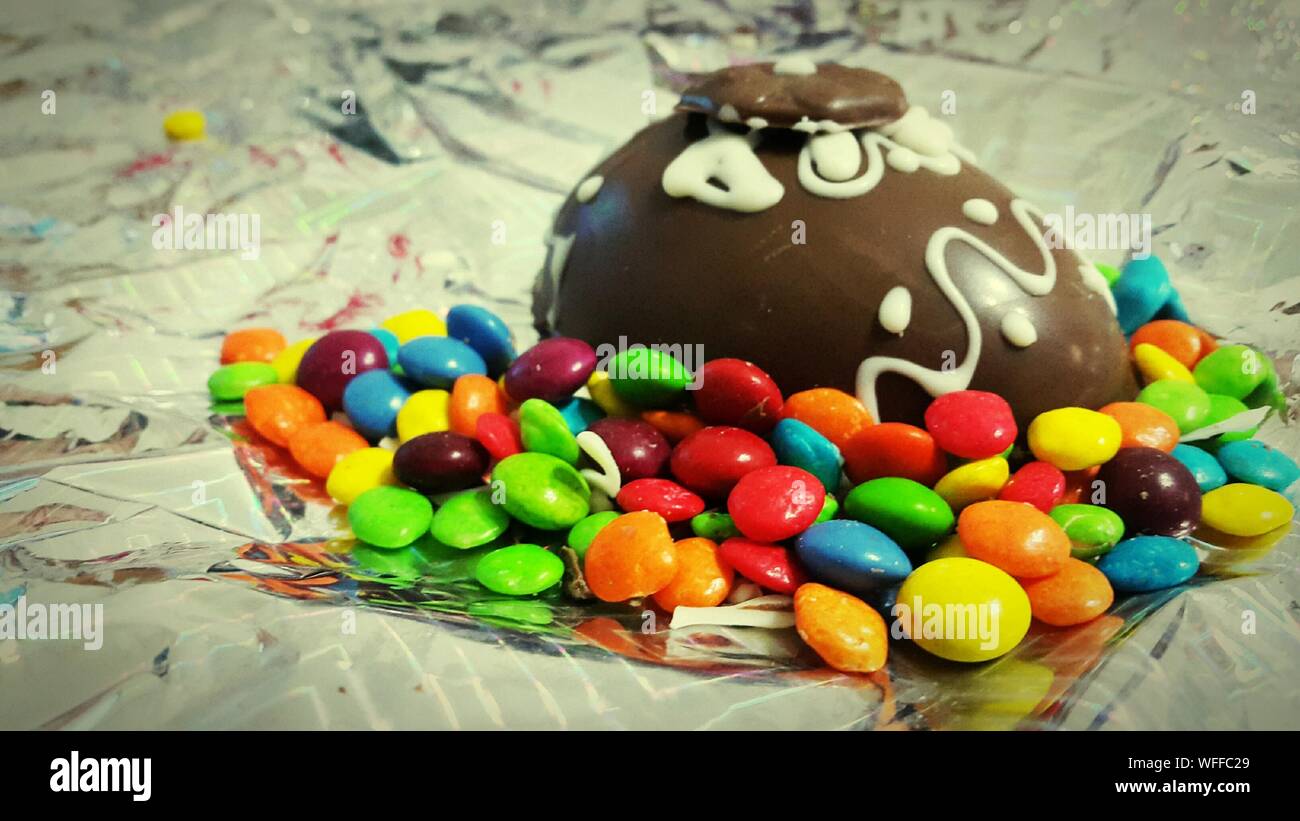 Colorful Candies With Easter Egg On Foil Stock Photo Alamy