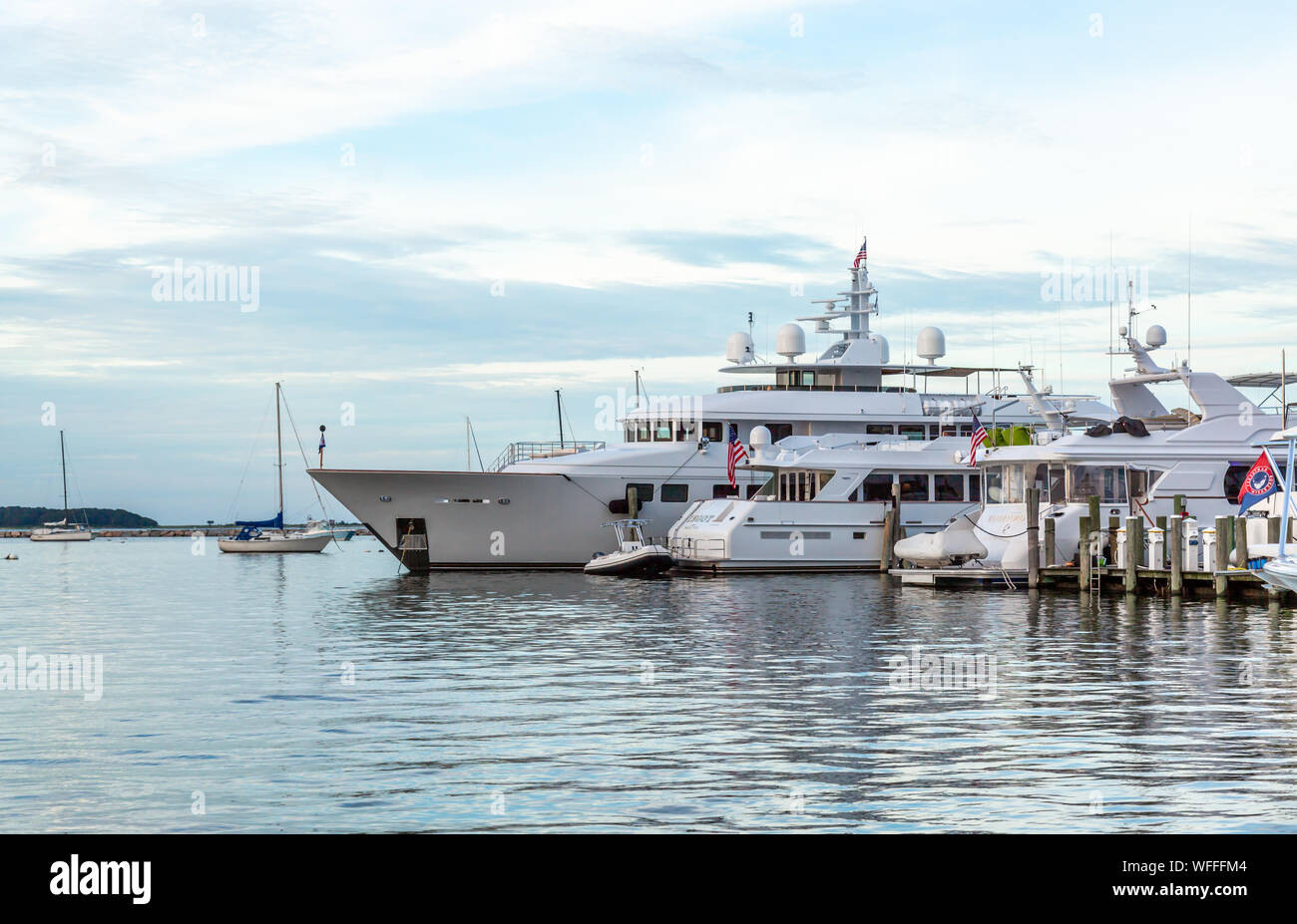 Yachts lined up on Long Wharf in Sag Harbor, NY Stock Photo