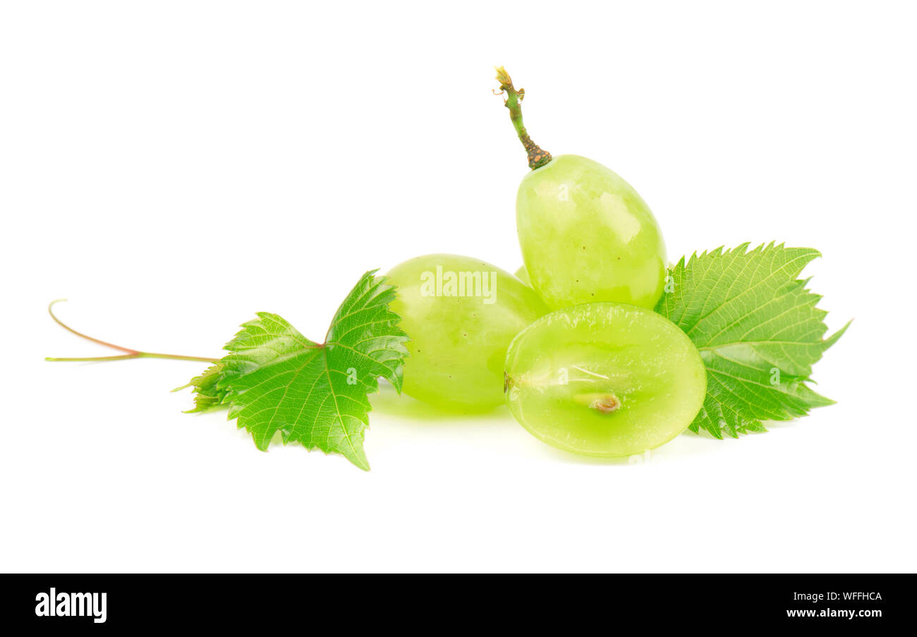 Green grape with leaves isolated on white background Stock Photo - Alamy