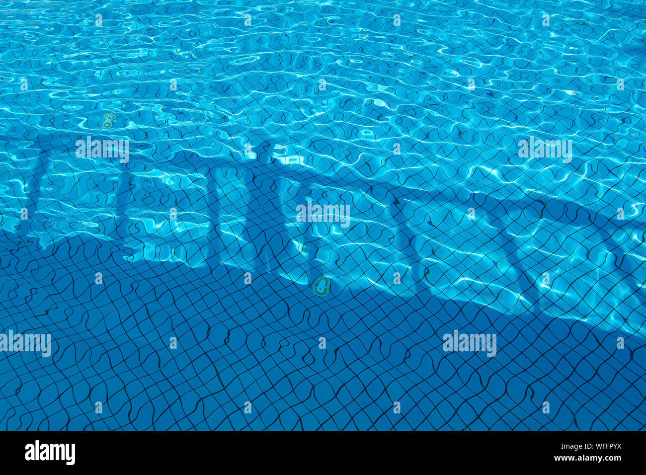Shadow Of Person On Rippled Water At Swimming Pool Stock Photo Alamy