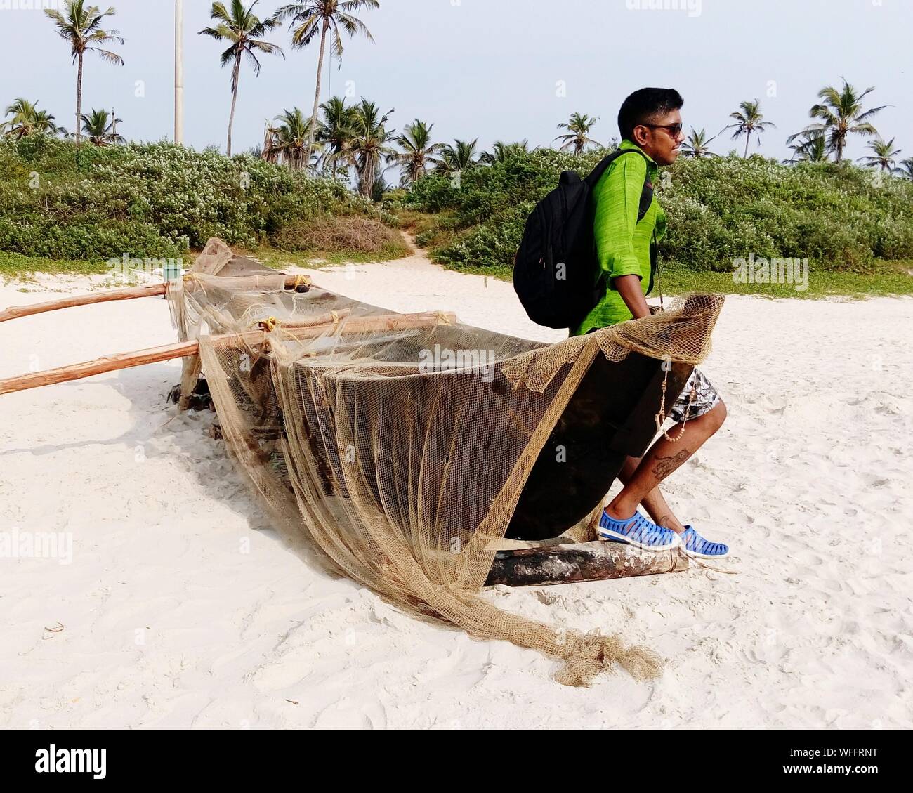 Indian man sitting on boat hi-res stock photography and images - Alamy