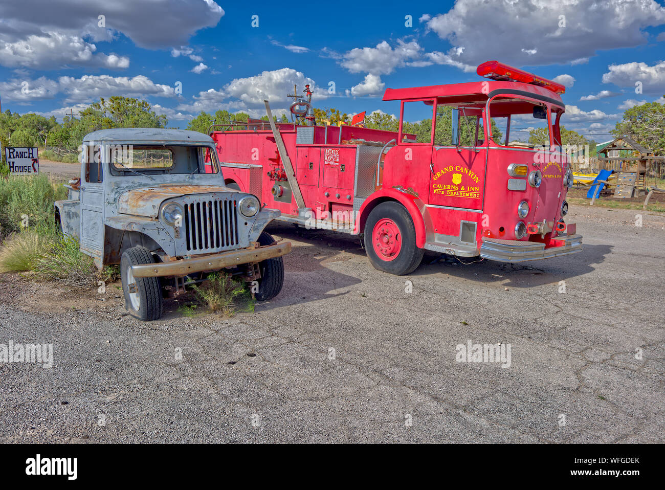 Old Fire truck and jeep outside Grand Canyon Caverns, Peach Springs, Mile Marker 115, Arizona, United States Stock Photo