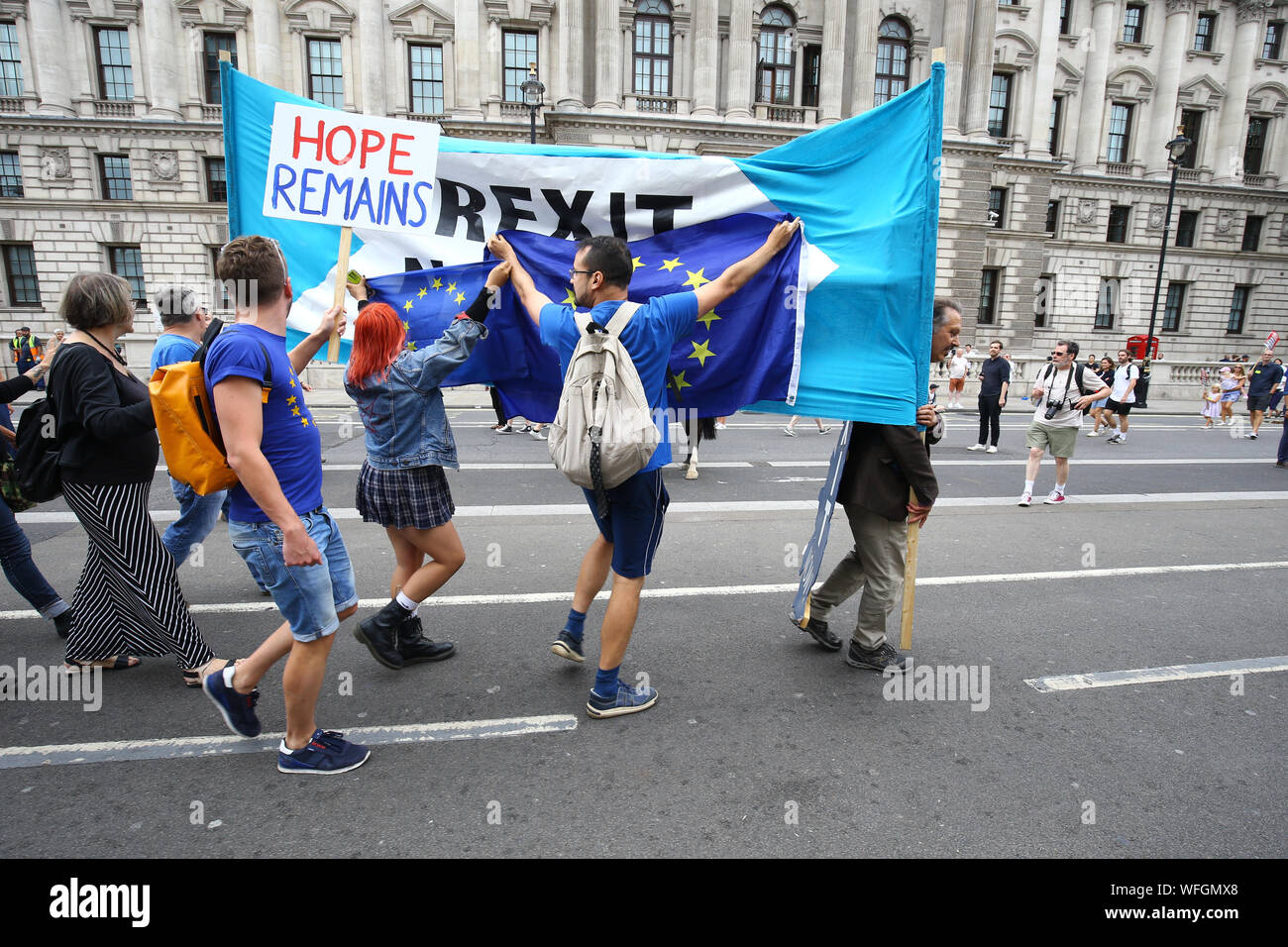 Protesters Taking Part In The Let Us Vote Day Of Action Organised By Another Europe Is Possible Campaign Group Cover A Brexit Now Sign In Central London While Demonstrating Against Prime Minister Protesters Taking Part In The Let Us Vote Day Of Action Organised By Another Europe Is Possible Campaign Group Cover A Brexit Now Sign In Central London While Demonstrating Against Prime Minister