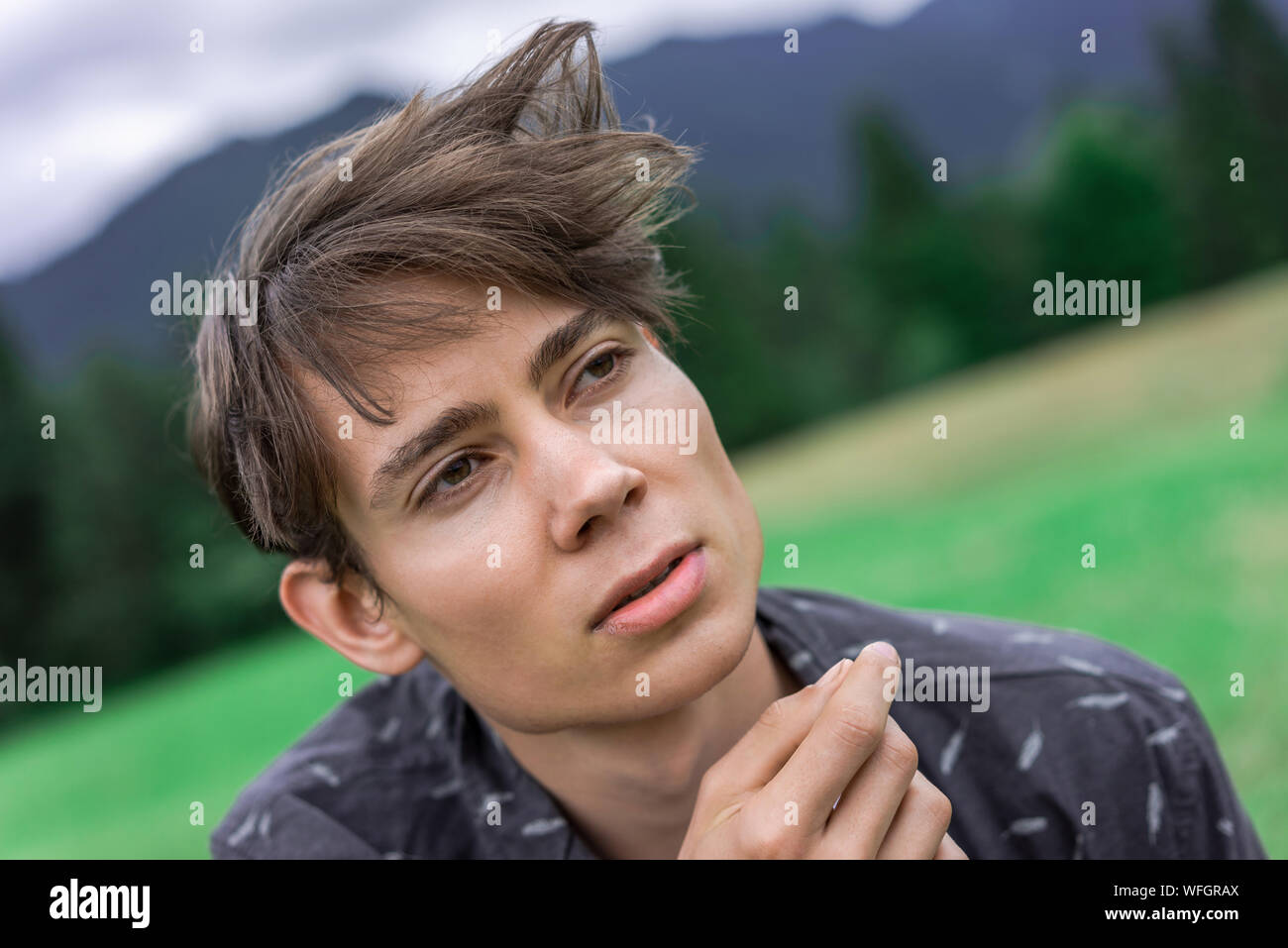 Contemplative Young Man Stock Photo