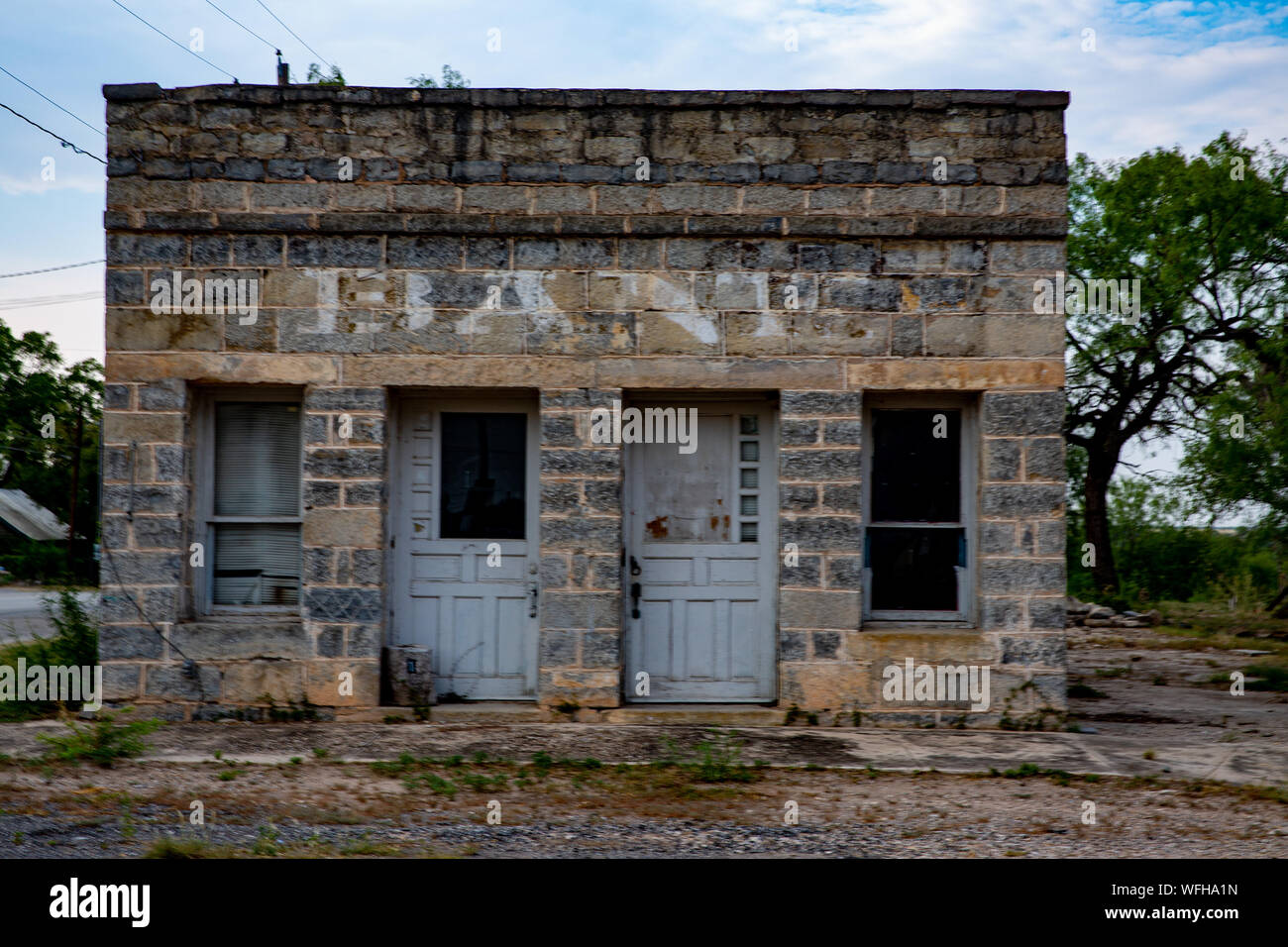 Ghost sign of old bank building in Paint Rock, Texas, built in 1870. Stock Photo