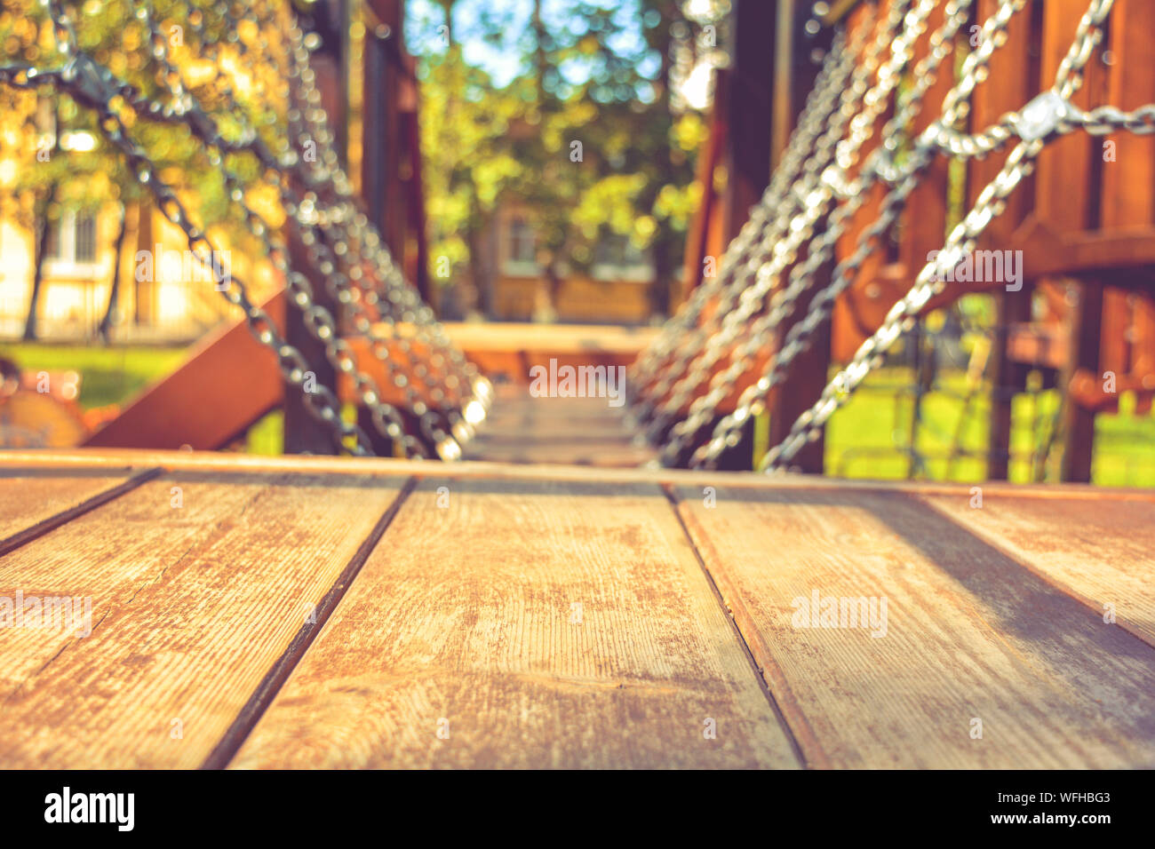Close Up Of Swinging Platform Hangs On Chains In Children S