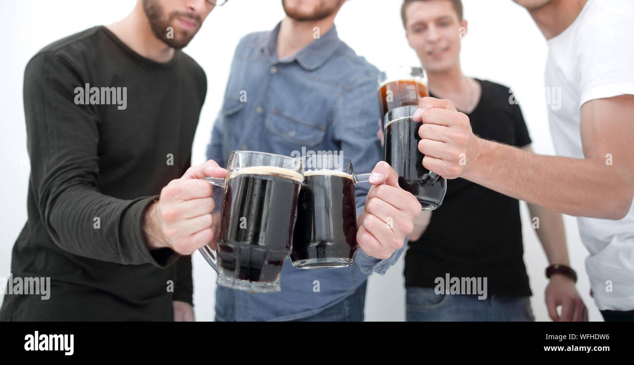 guys with mugs of beer isolated on white background Stock Photo - Alamy