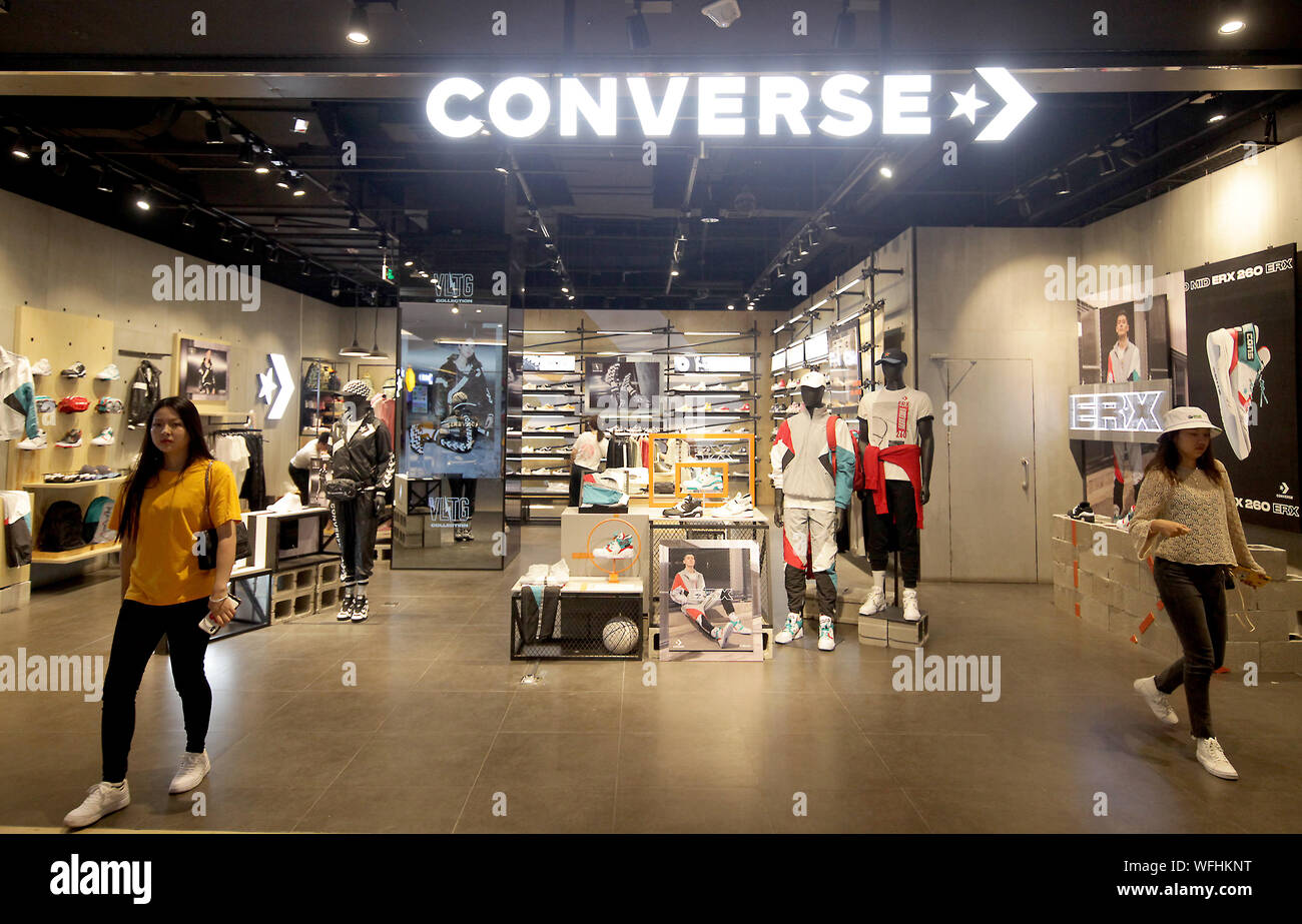 Chinese shop at a Converse apparel store in an international shopping mall in Beijing on Saturday, 31 August 2019.  U.S. President Donald Trump's latest tariffs targets Chinese-made products exported to the U.S., including U.S. clothing, shoes and appliances.    Photo by Stephen Shaver/UPI Stock Photo