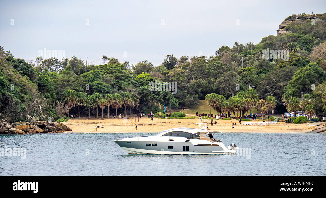 Pleasure craft boat anchored in Shelley Beach Cabbage Tree Bay Manly Sydney NSW Australia Stock
