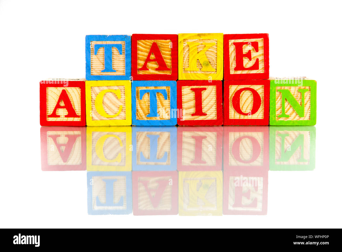 Colorful Take Action Toy Blocks Text Against White Background Stock Photo