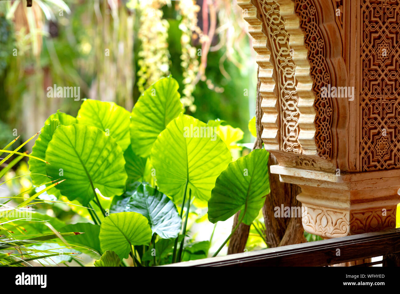 Arch Decorated With Arabic Ornaments With An Interior Green Garden
