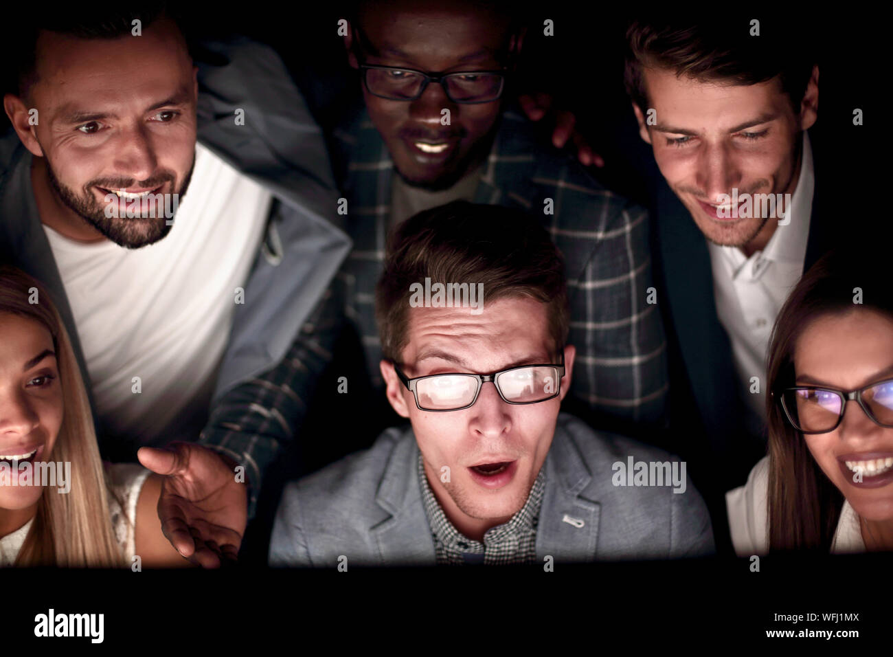 close up.a young programmer working late at the office Stock Photo