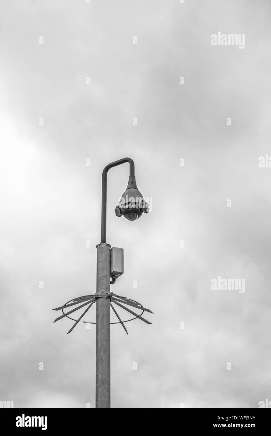 CCTV camera with spiked protection ring Stock Photo