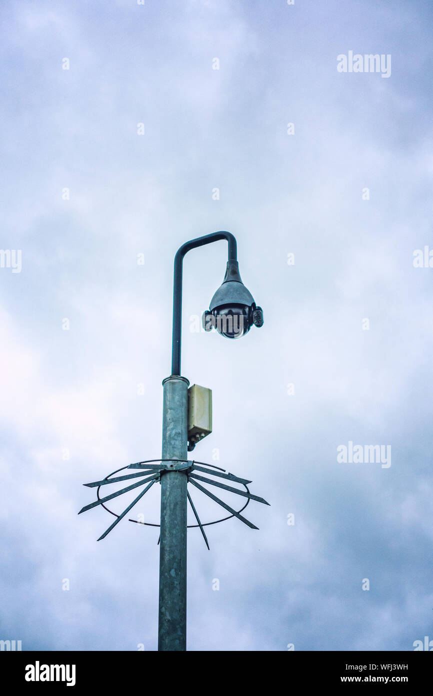 CCTV camera with spiked protection ring Stock Photo