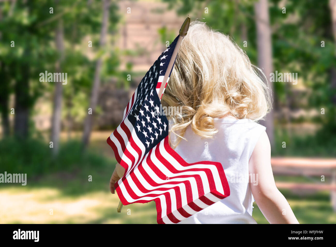 Girls holding flag hi-res stock photography and images - Alamy