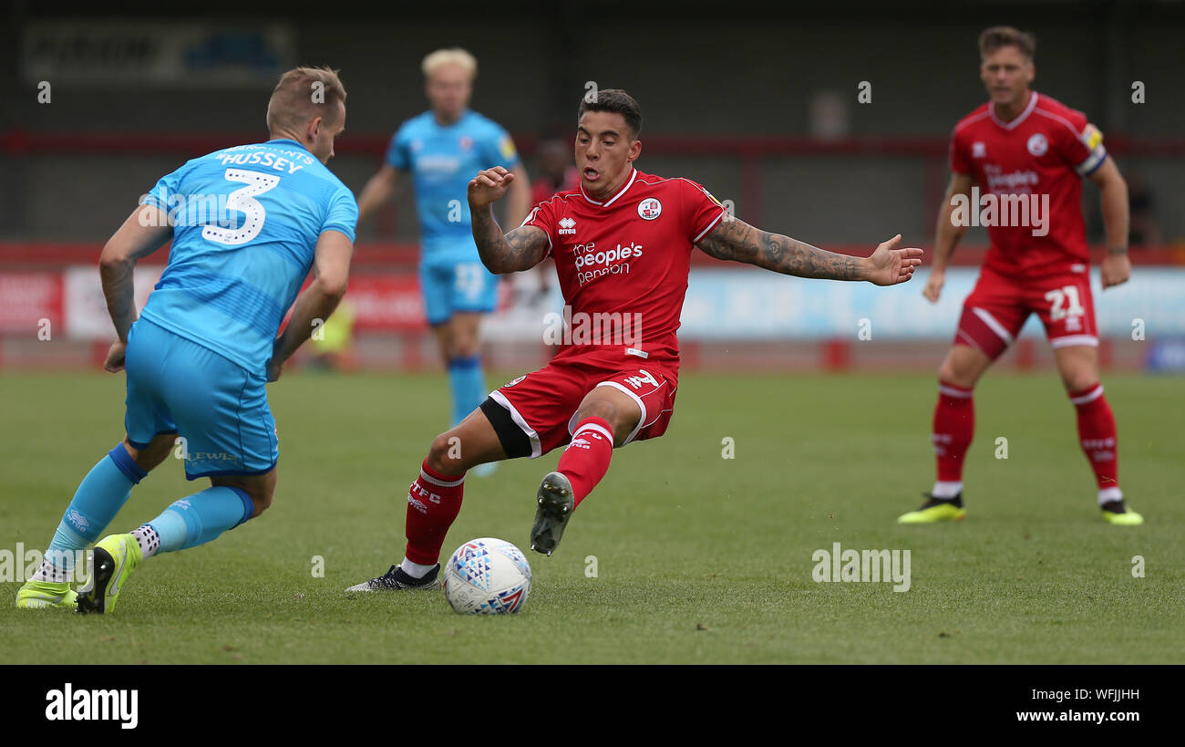 Crawley, UK. 31 August 2019 Crawley Town's Reece Grego-Cox tackles Cheltenham's Chris Hussey during the Sky Bet League One match between Crawley Town and Cheltenham Town at the Peoples Pension Stadium in Crawley. Credit: Telephoto Images / Alamy Live News Stock Photo