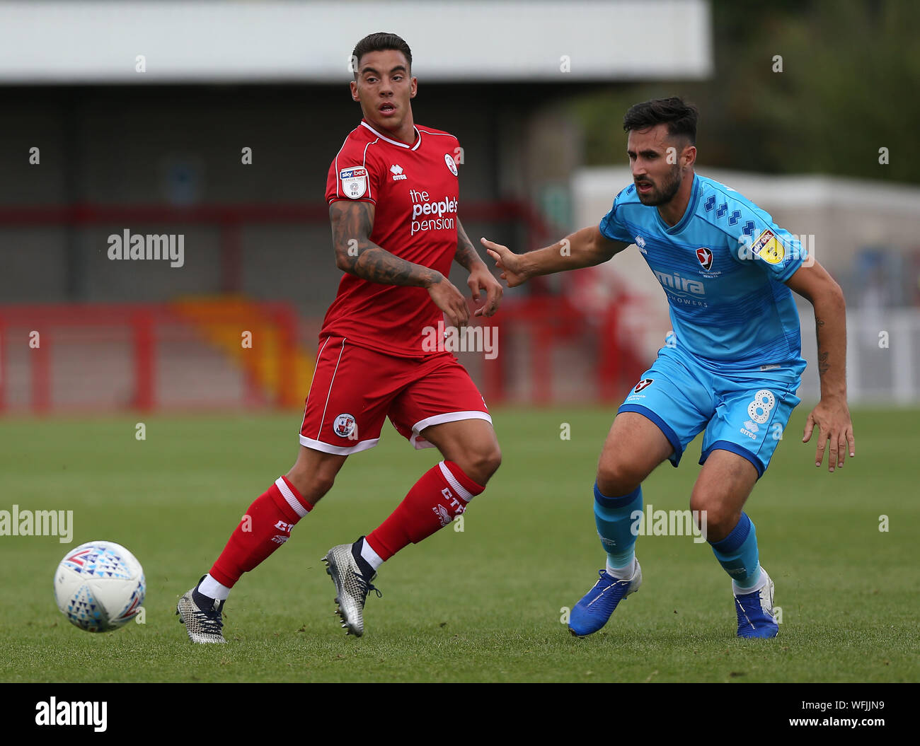 Crawley, UK. 31 August 2019 Crawley Town's Reece Grego-Cox  and Cheltenham's Chris Clements during the Sky Bet League One match between Crawley Town and Cheltenham Town at the Peoples Pension Stadium in Crawley. Credit: Telephoto Images / Alamy Live News Stock Photo