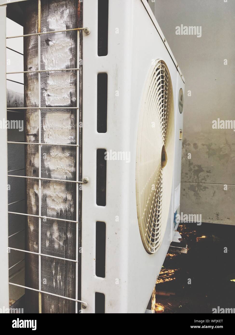 Close-up Of Air Conditioner Compressor Stock Photo