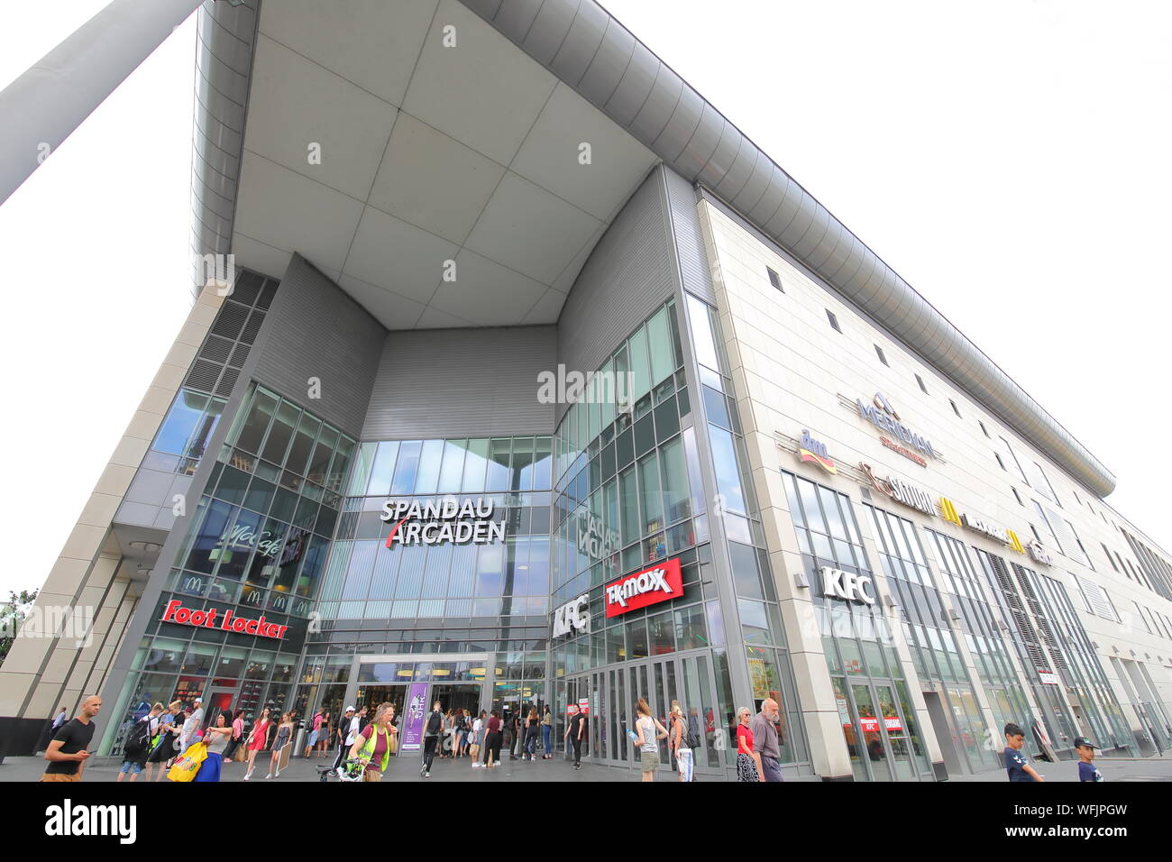 People visit Spandau Arcaden shopping mall Berlin Germany Stock Photo