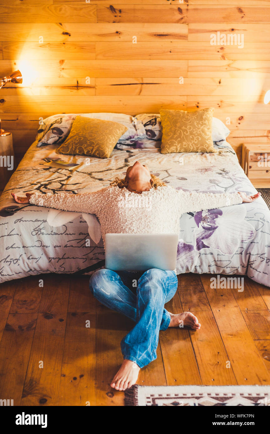 Relaxed or stressed people caucasian woman at home or hotel room with ...