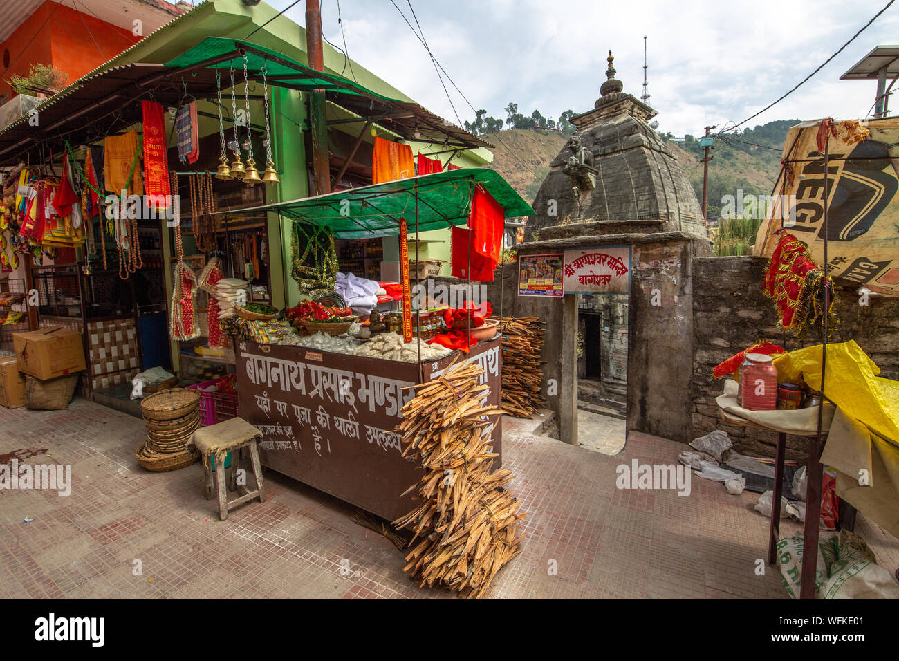 Ancient stone Hindu temple with old city buildings at Bageshwar district near Kausani, Uttarakhand, India Stock Photo