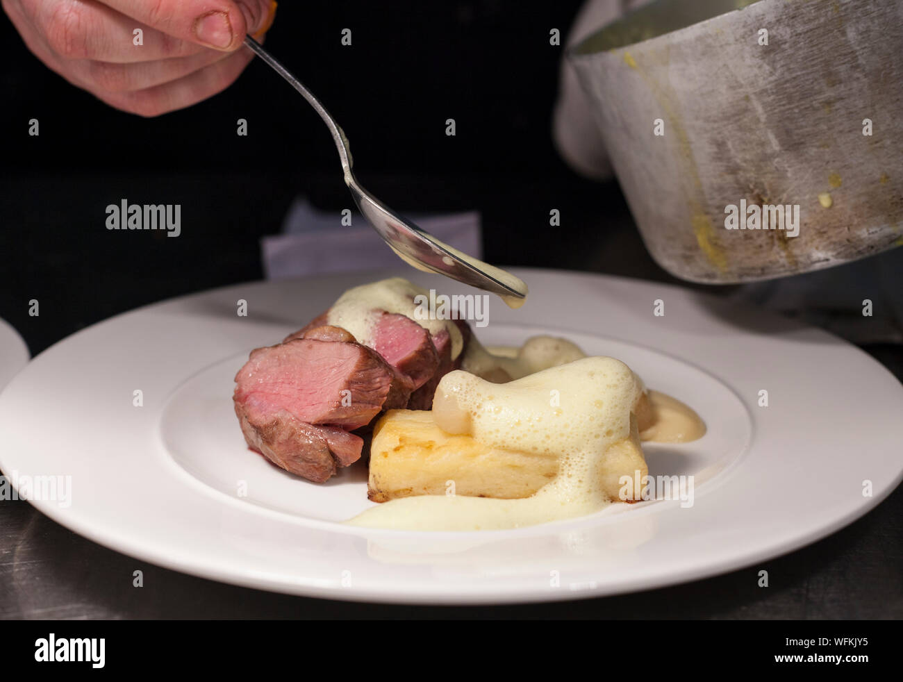 Setting Food Aside Food, plated, in a restaurant kitchen setting, but with no people ...