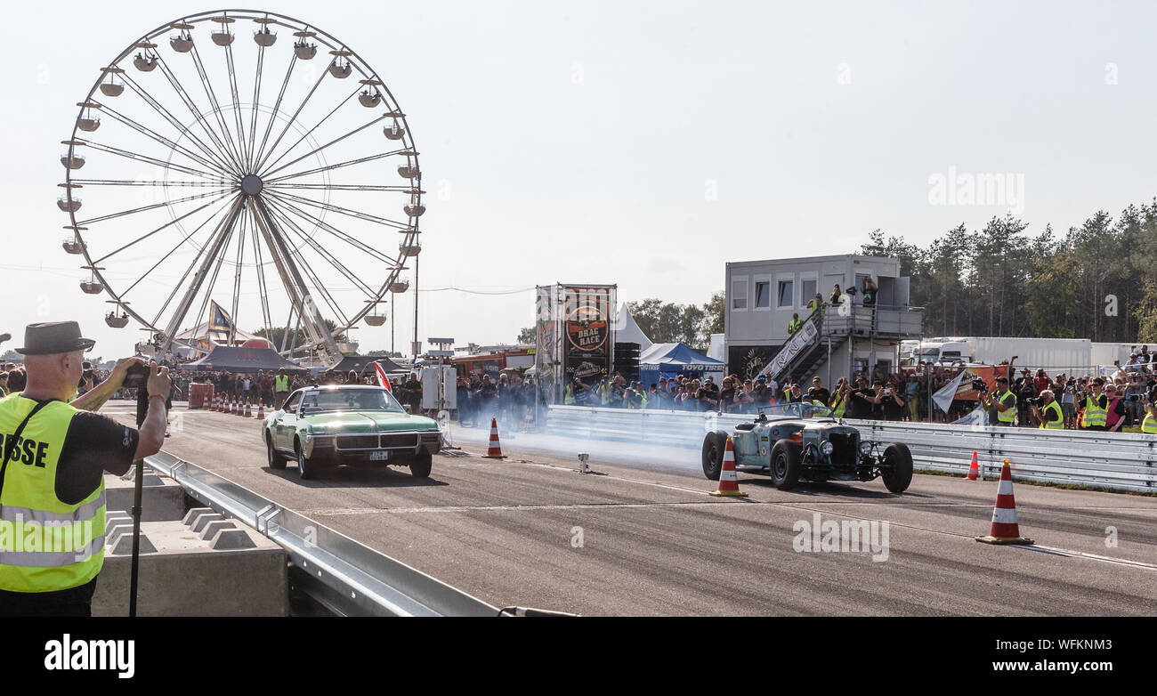 Hasenmoor, Germany. 31st Aug, 2019. TV emigrant Konny Reimann (left) starts in a 1968 Buick Riviera against Andy Feldmann in a 1932 Koslovsky to the 'Werner' main race over an eighth mile, which he lost at the end. Credit: Markus Scholz/dpa/Alamy Live News Stock Photo