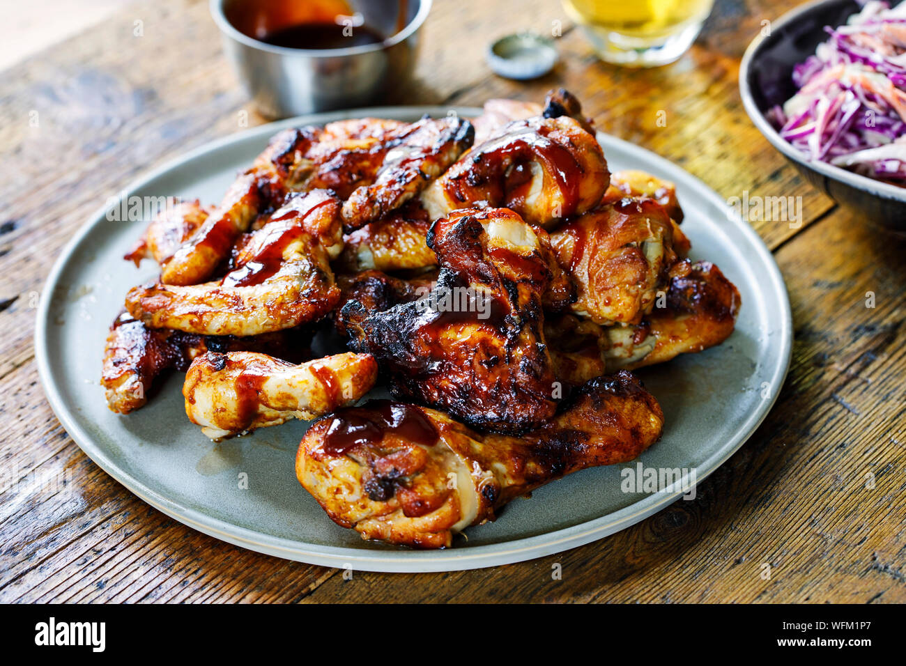 Barbecue chicken wings and drumsticks with sauce Stock Photo