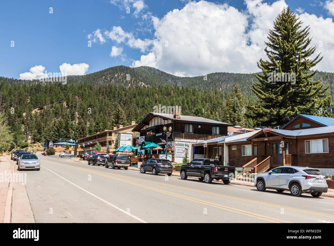 RED RIVER, NM, USA-10 JULY 2018:  Main Street of Red River, with mountains in background. Stock Photo