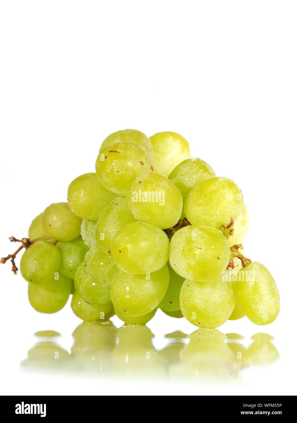Close-up Of Grapes On White Background Stock Photo