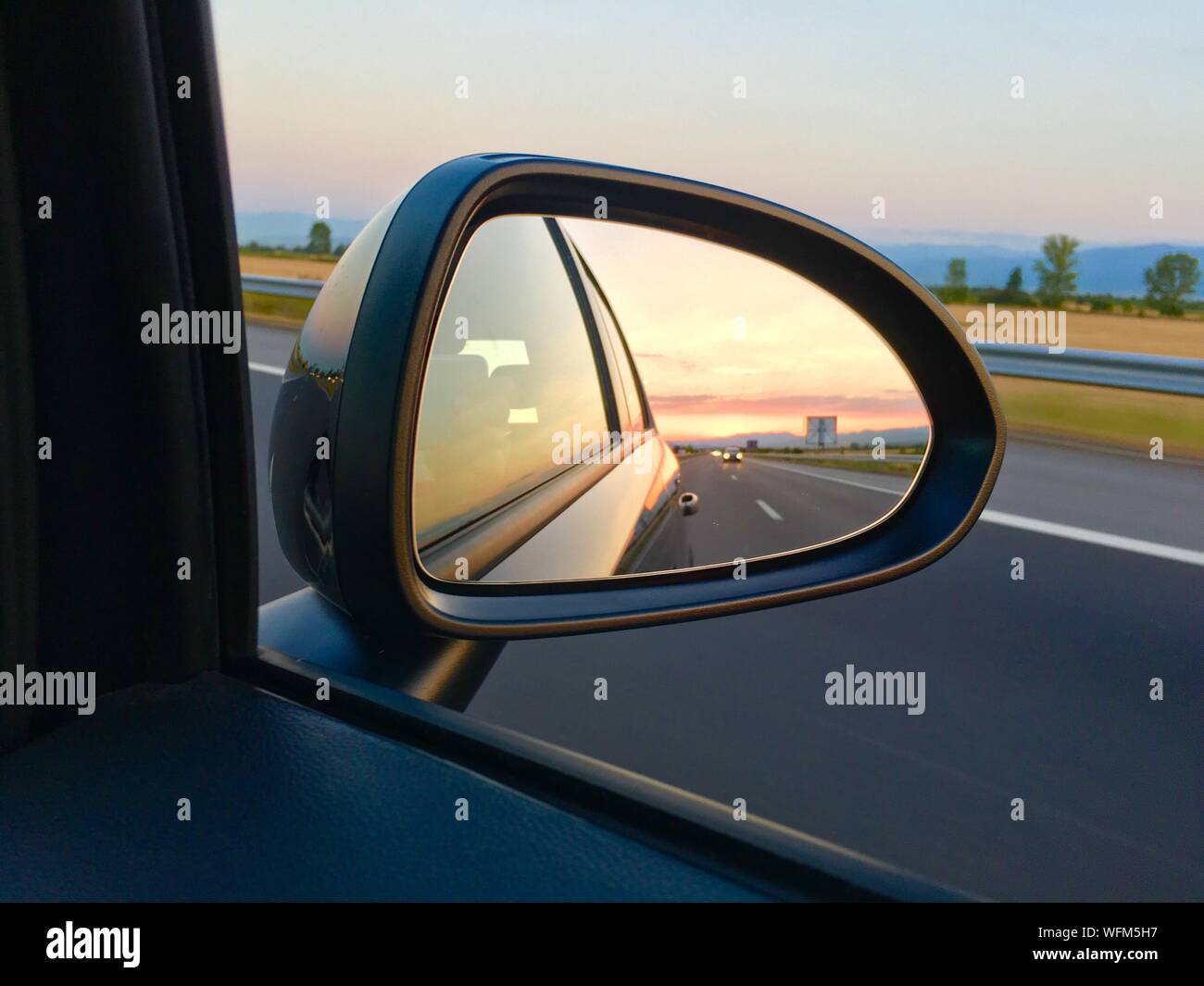 Reflection In Sideview Mirror Of Car Stock Photo Alamy