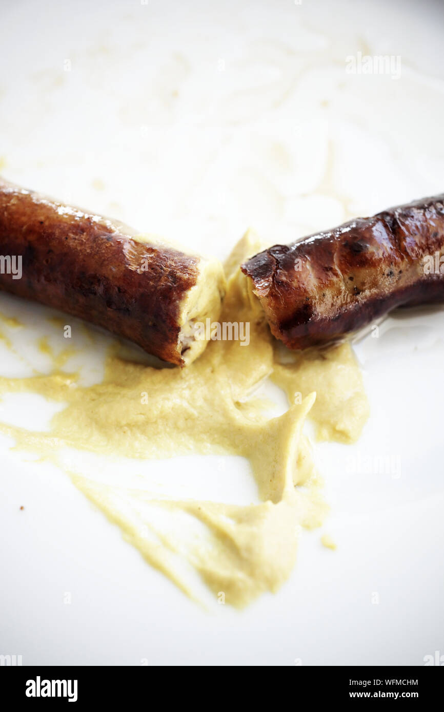 Close-up Of Bratwurst In Plate Stock Photo