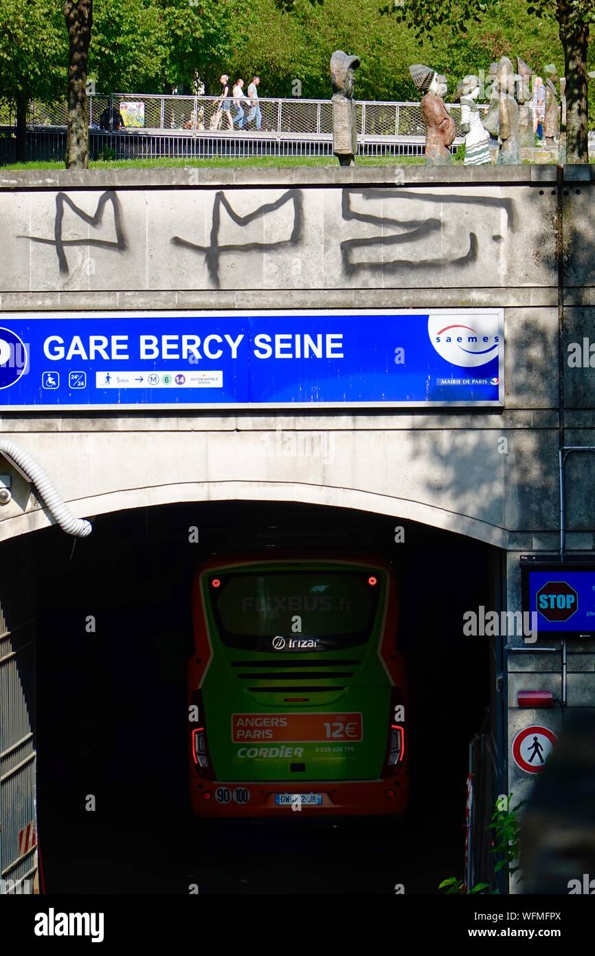 Bus in tunnel going under the Parc Bercy, into the bus terminal, Gare Bercy Seine, Paris, France Stock Photo