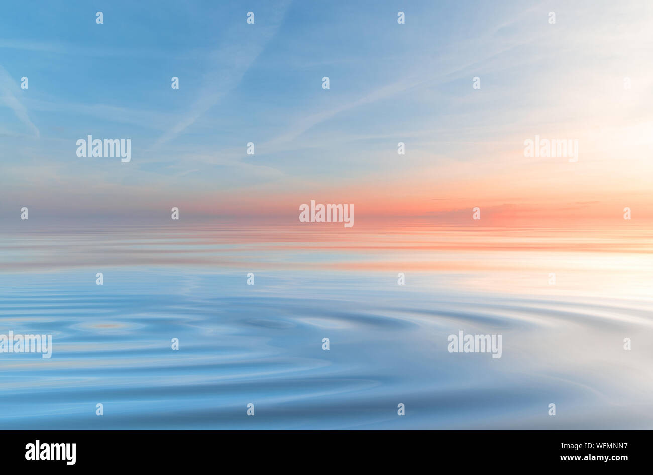 Beautiful sunset and blue sky background Stock Photo - Alamy