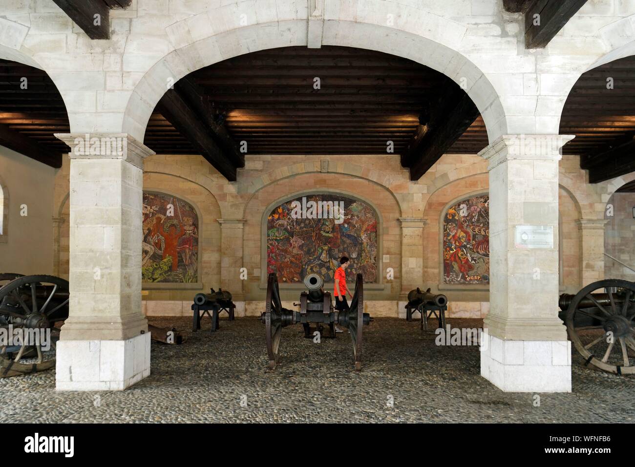 Switzerland, Geneva, Swiss Confederation, in the old town the guns and the ceramic frescoes of the covered square of St. Peter Street Stock Photo
