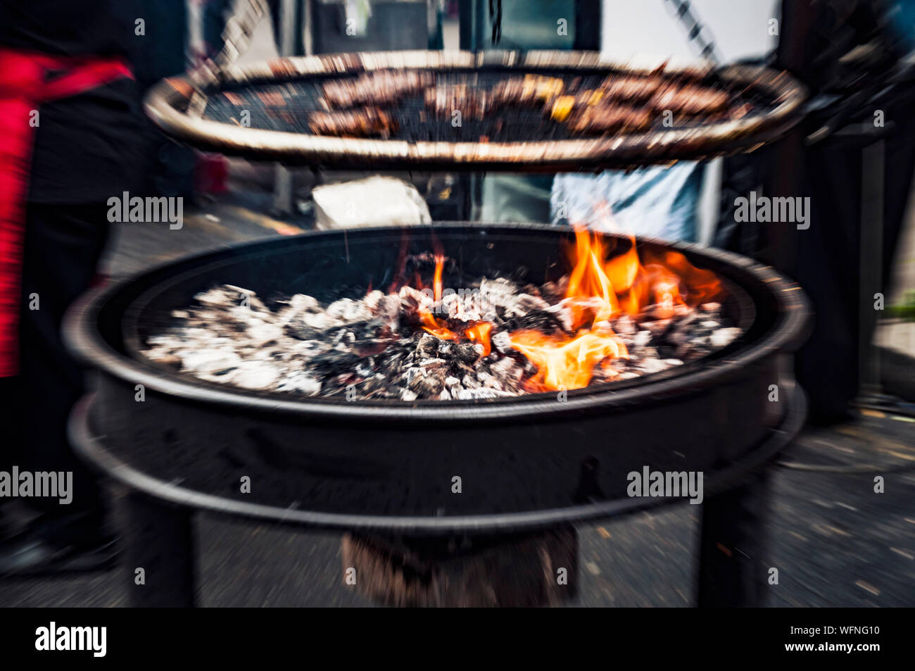 Wood burning grill on the street cooking seafood burgers. Dalkey, Dublin,  Ireland.25 August 2019. Seafood “Dalkey Lobster Festival” Stock Photo -  Alamy