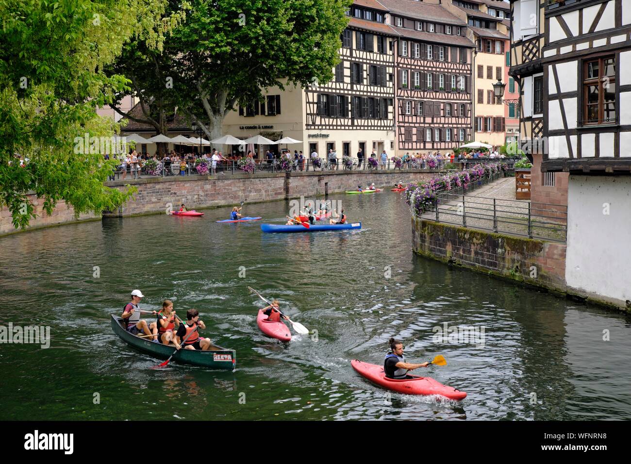 France, Bas Rhin, Strasbourg, old town listed as World Heritage by UNESCO,  Place Benjamin Six, from the swing bridge on the Ill river, canoe kayak,  half timbered houses Stock Photo - Alamy
