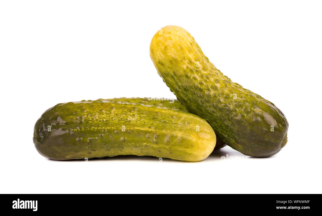 Pickled cucumber isolated on white background. Marinated pickled cucumber isolated. Closeup