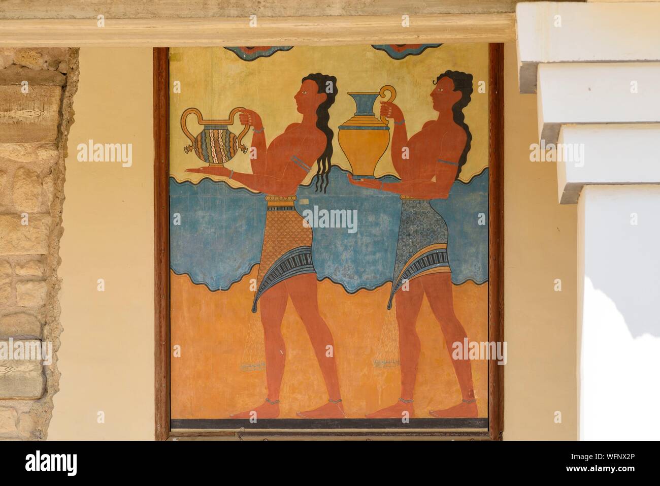 Greece, Crete, Knossos, archeological site, Palace of King Minos, fresco of the procession: young Minoans carrying ritual vases (15th century BC) Stock Photo