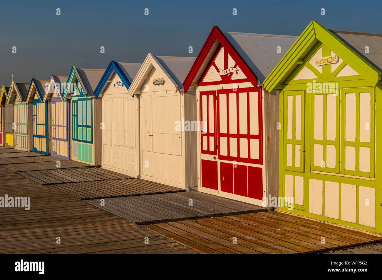 France, Somme, Cayeux sur Mer, The path boards in Cayeux sur Mer is the longest in Europe, it sports its colorful beach cabins with evocative names on nearly 2 km long on the pebble cord Stock Photo