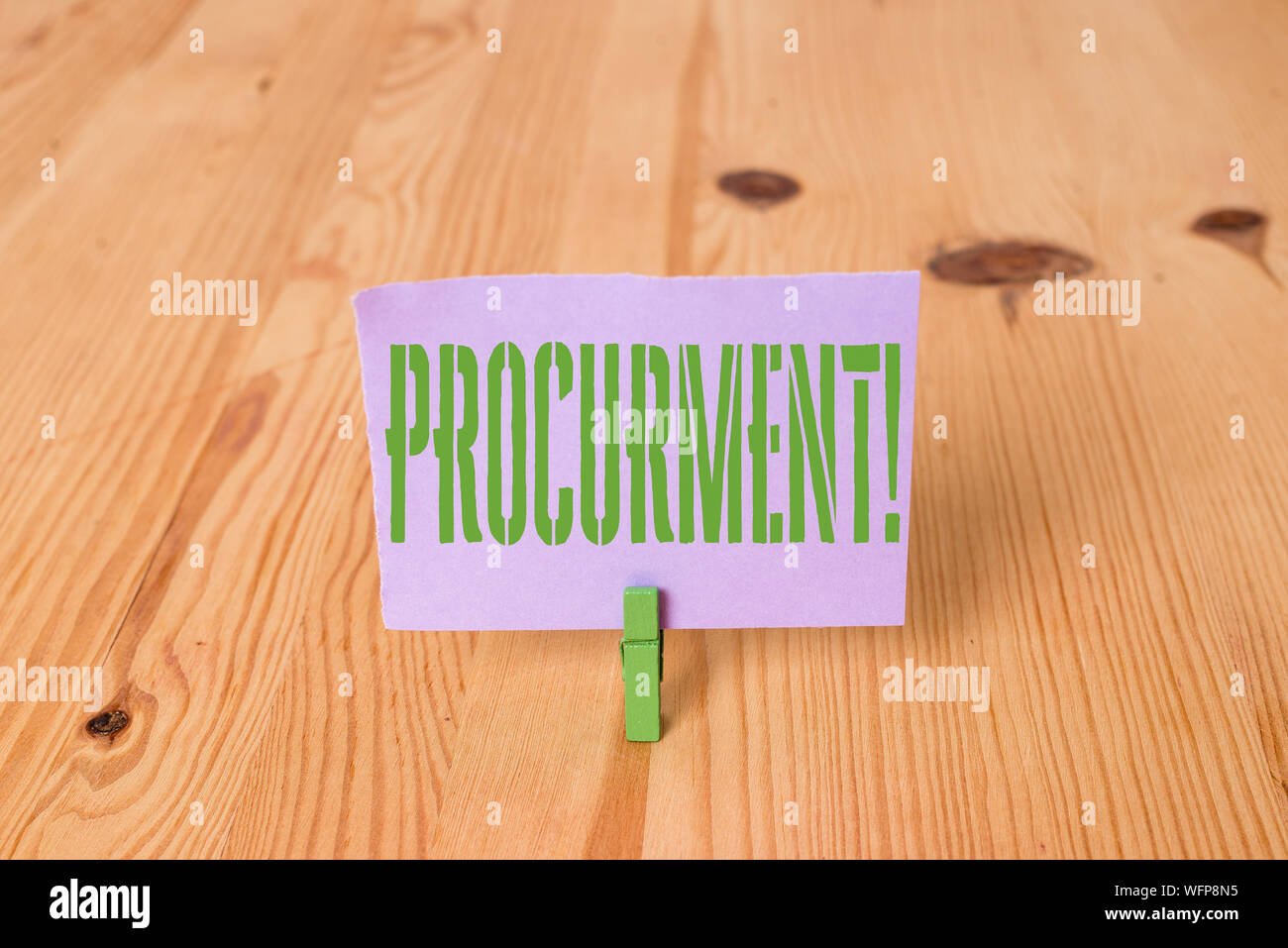 Writing note showing Procurment. Business concept for action of acquiring military equipment and supplies Wooden floor background green clothespin gro Stock Photo